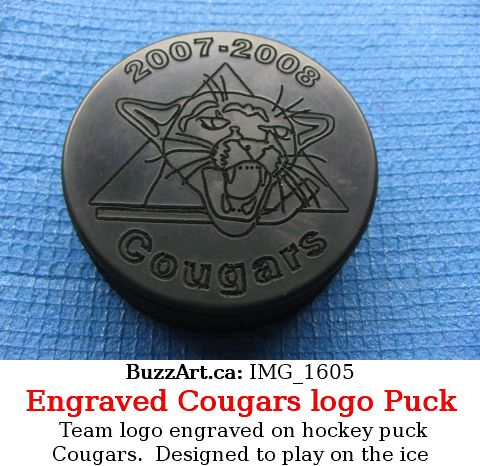 Cougars hockey team engraved puck